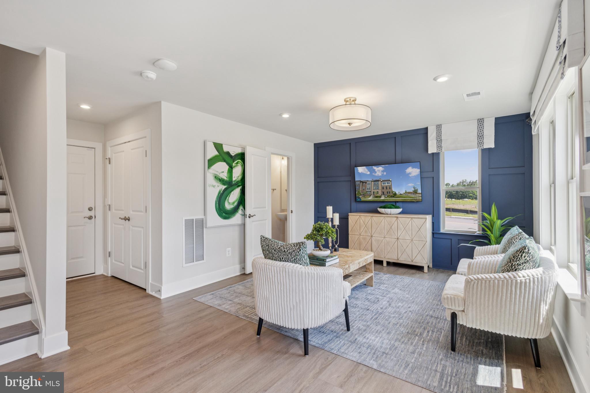 3803 Shale Ridge Road Woodbridge, VA 22193 - Photo 2 of 23 a living room with furniture and a wooden floor