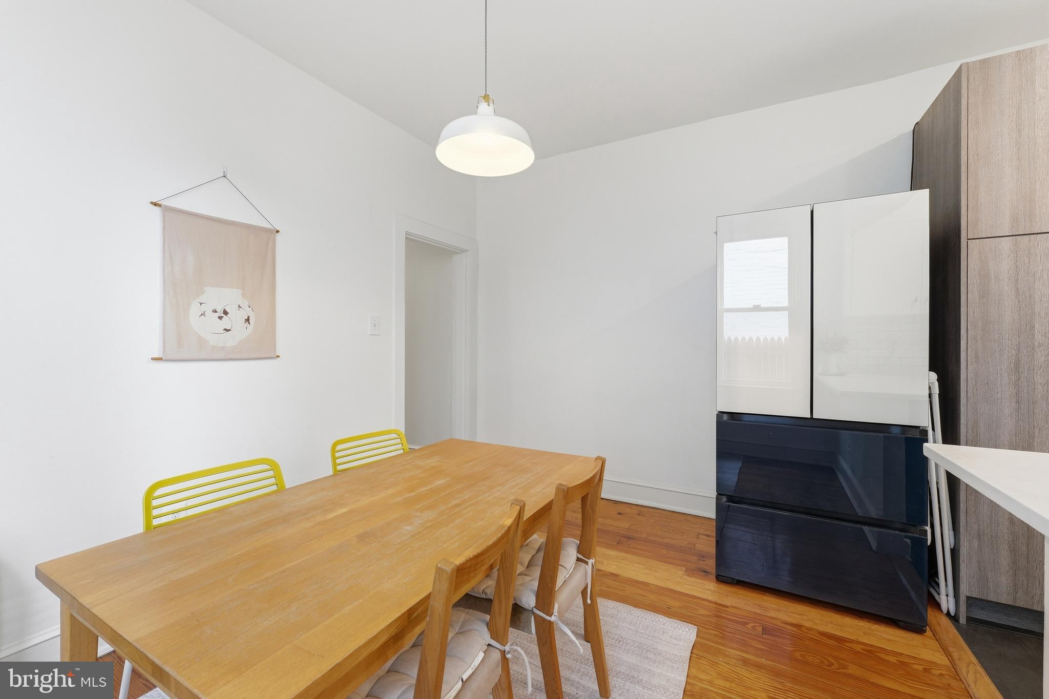 215 15th Street Northeast Washington, DC 20002 - Photo 13 of 43 a view of a dining room with furniture and wooden floor