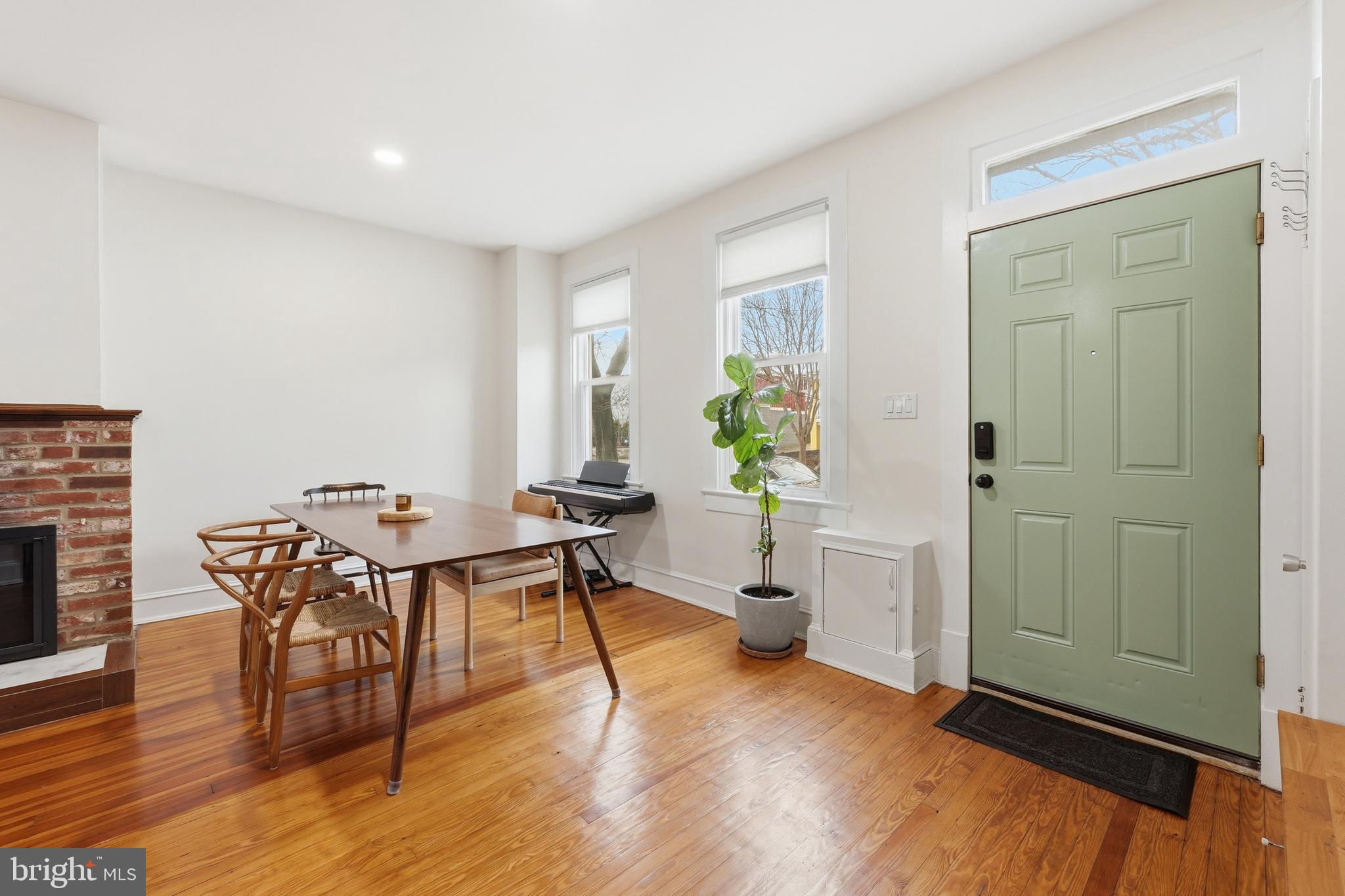 215 15th Street Northeast Washington, DC 20002 - Photo 3 of 43 a view of a dining room with furniture and wooden floor