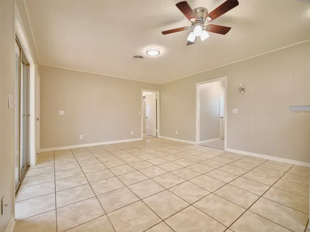 a view of an empty room and window
