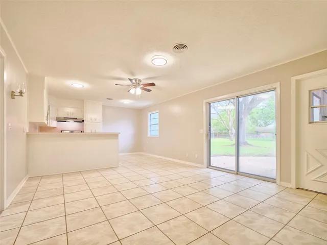 a view of an empty room and window