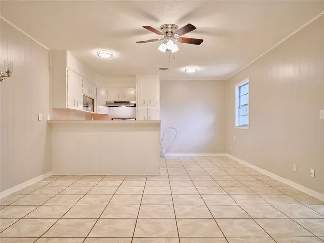 a view of walk in closet with cabinet