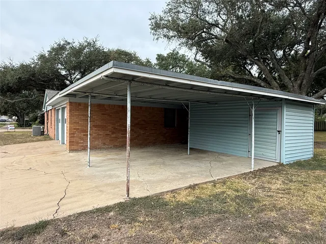 a house with trees in the background