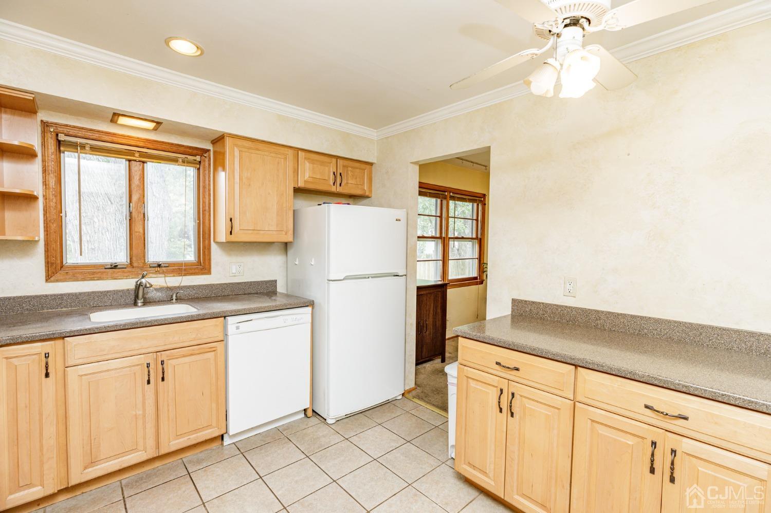 38 Marlin Avenue East Edison, NJ 08820 - Photo 12 of 36 a kitchen with white cabinets and white appliances
