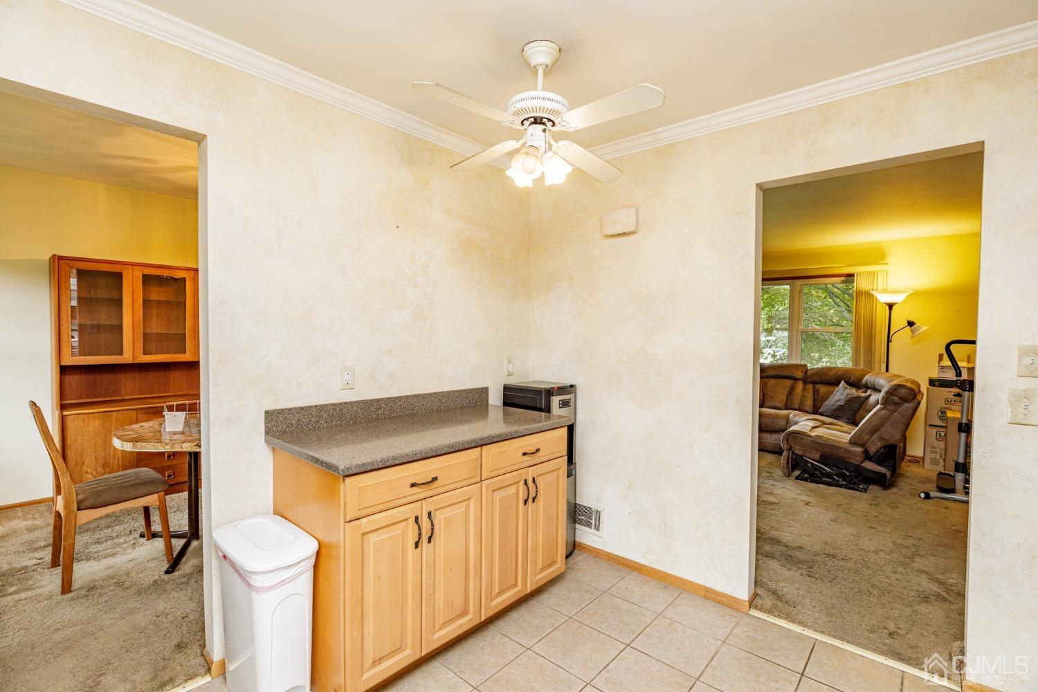 38 Marlin Avenue East Edison, NJ 08820 - Photo 13 of 36 a hallway with a stove a washer and dryer