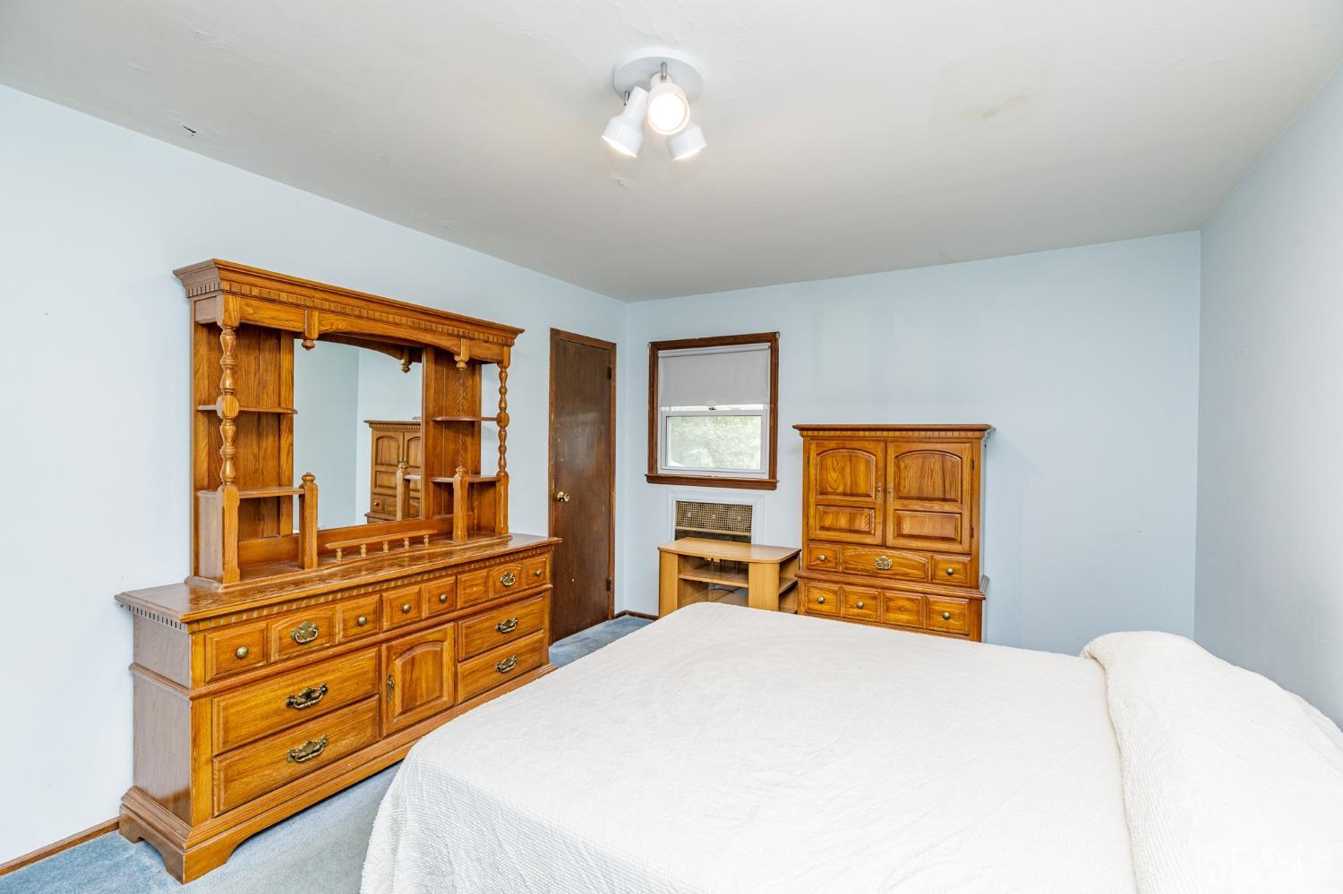 38 Marlin Avenue East Edison, NJ 08820 - Photo 16 of 36 a bedroom with a bed and wooden floor