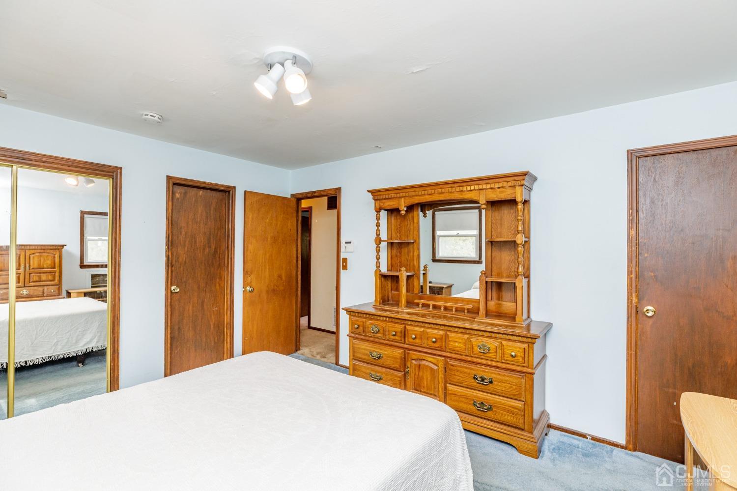 38 Marlin Avenue East Edison, NJ 08820 - Photo 17 of 36 a bedroom with a bed and wooden floor