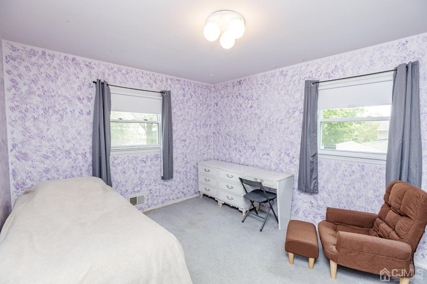 38 Marlin Avenue East Edison, NJ 08820 - Photo 18 of 36 a spacious bedroom with a bed and a couch