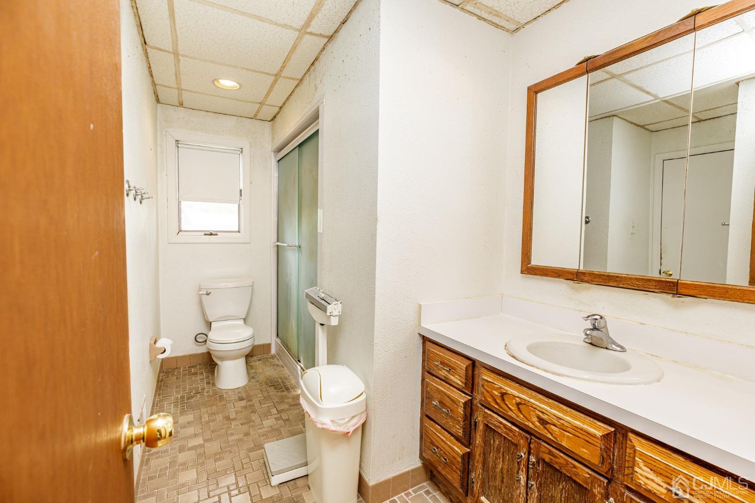 38 Marlin Avenue East Edison, NJ 08820 - Photo 22 of 36 a bathroom with a sink a toilet and shower
