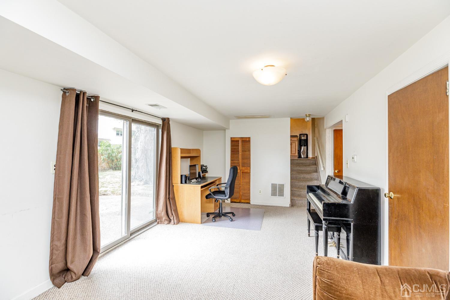 38 Marlin Avenue East Edison, NJ 08820 - Photo 25 of 36 a view of a livingroom with furniture and windows