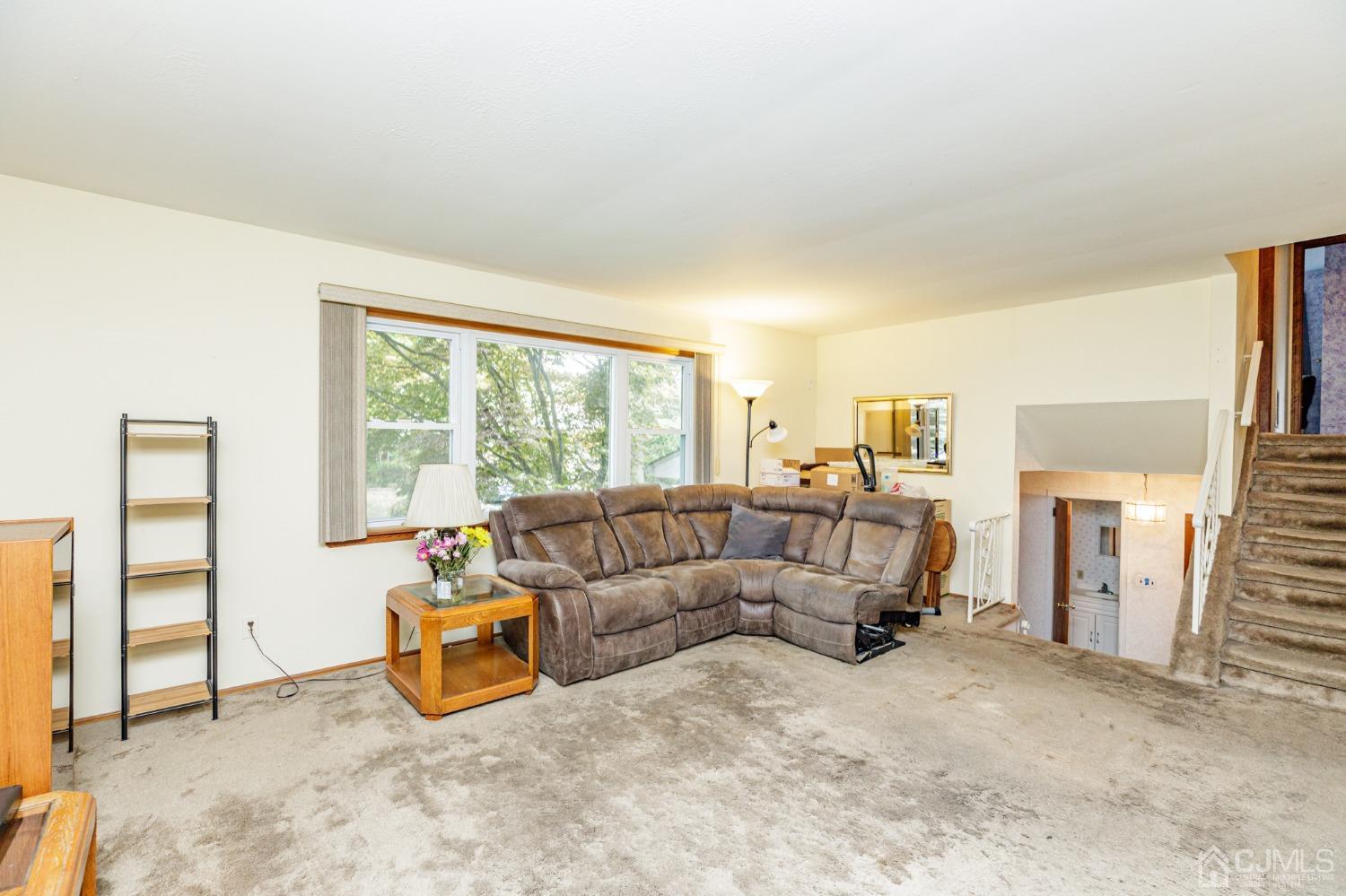 38 Marlin Avenue East Edison, NJ 08820 - Photo 5 of 36 a living room with furniture and a window