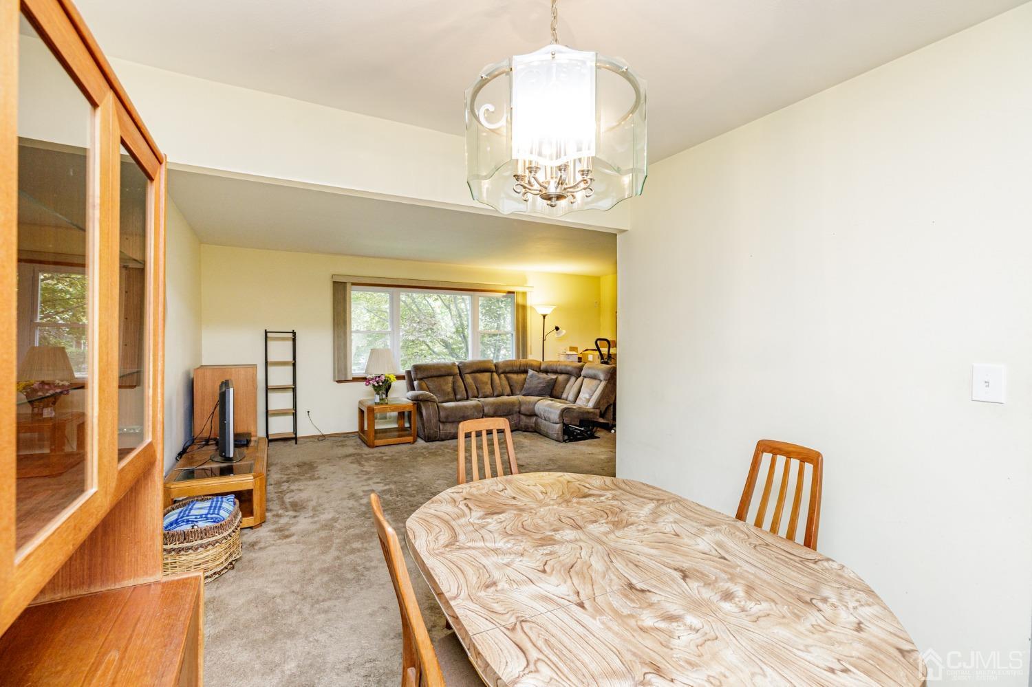 38 Marlin Avenue East Edison, NJ 08820 - Photo 9 of 36 a view of a livingroom with furniture window and wooden floor