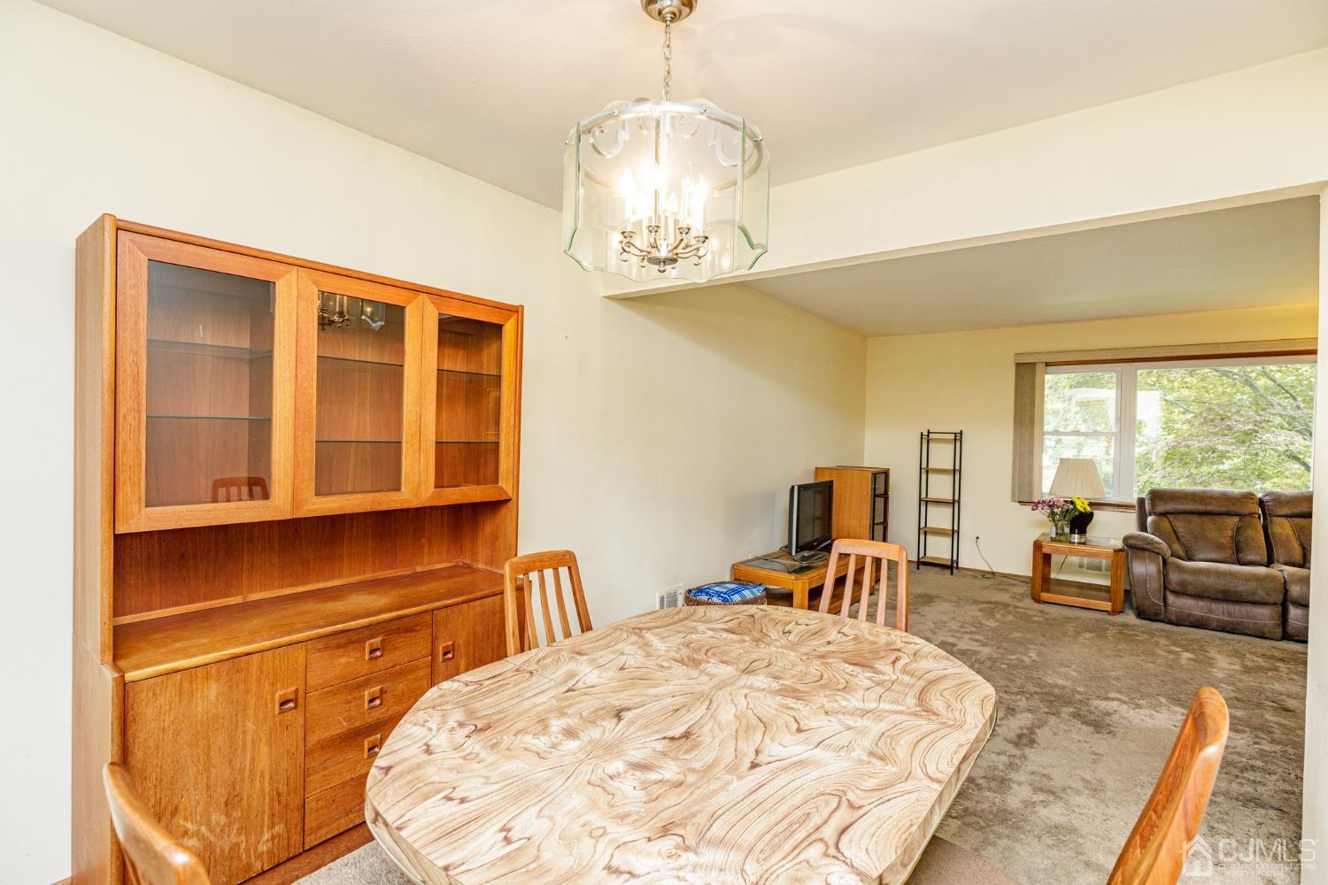 38 Marlin Avenue East Edison, NJ 08820 - Photo 10 of 36 a bed room with a bed and a chair