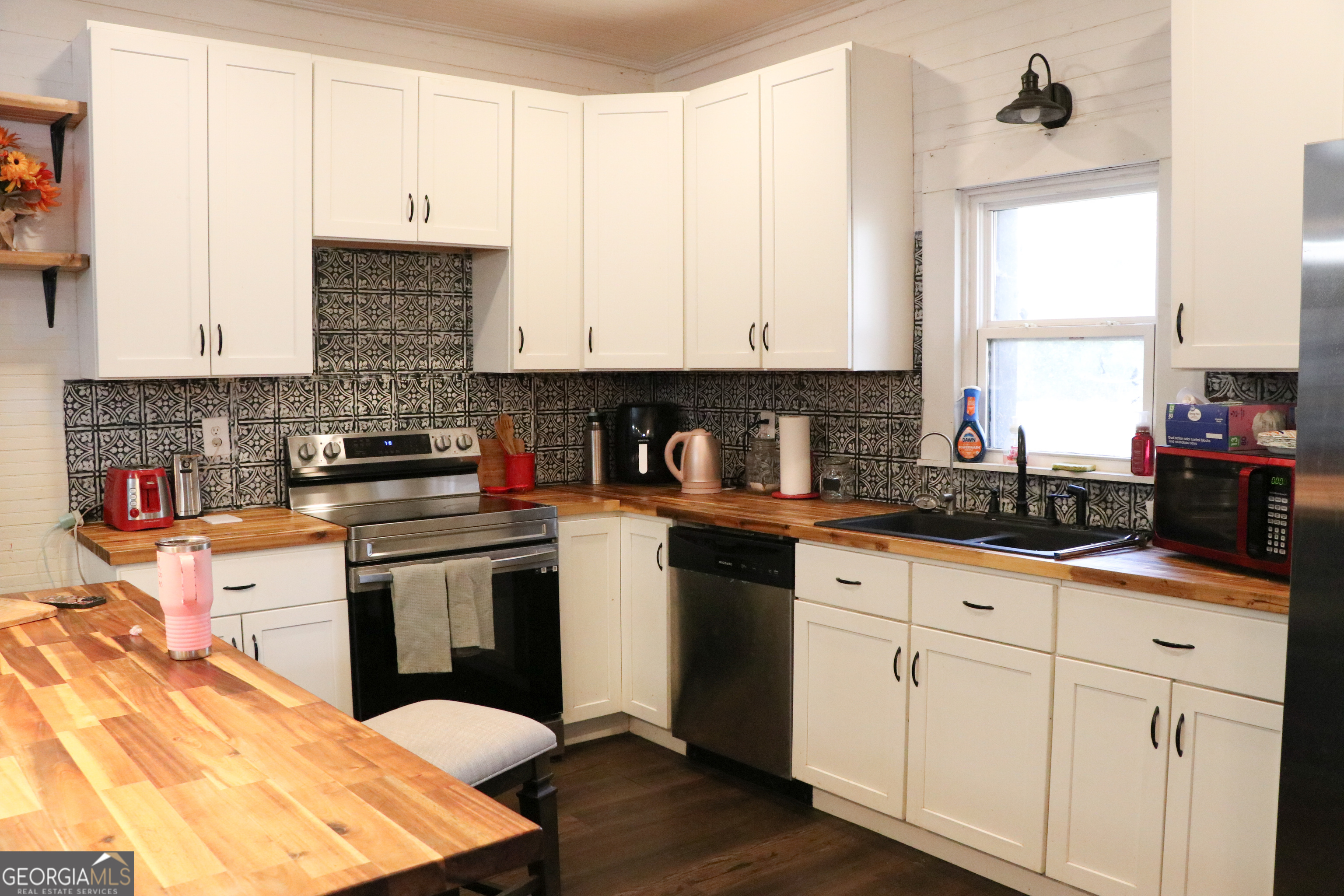 441 Lyerly Dam Road Lyerly, GA 30730 - Photo 35 of 80 a kitchen with granite countertop white cabinets and white appliances