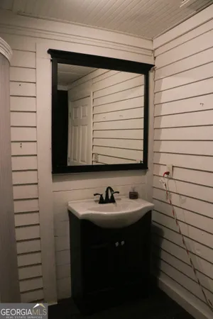 a room with a chair and a window