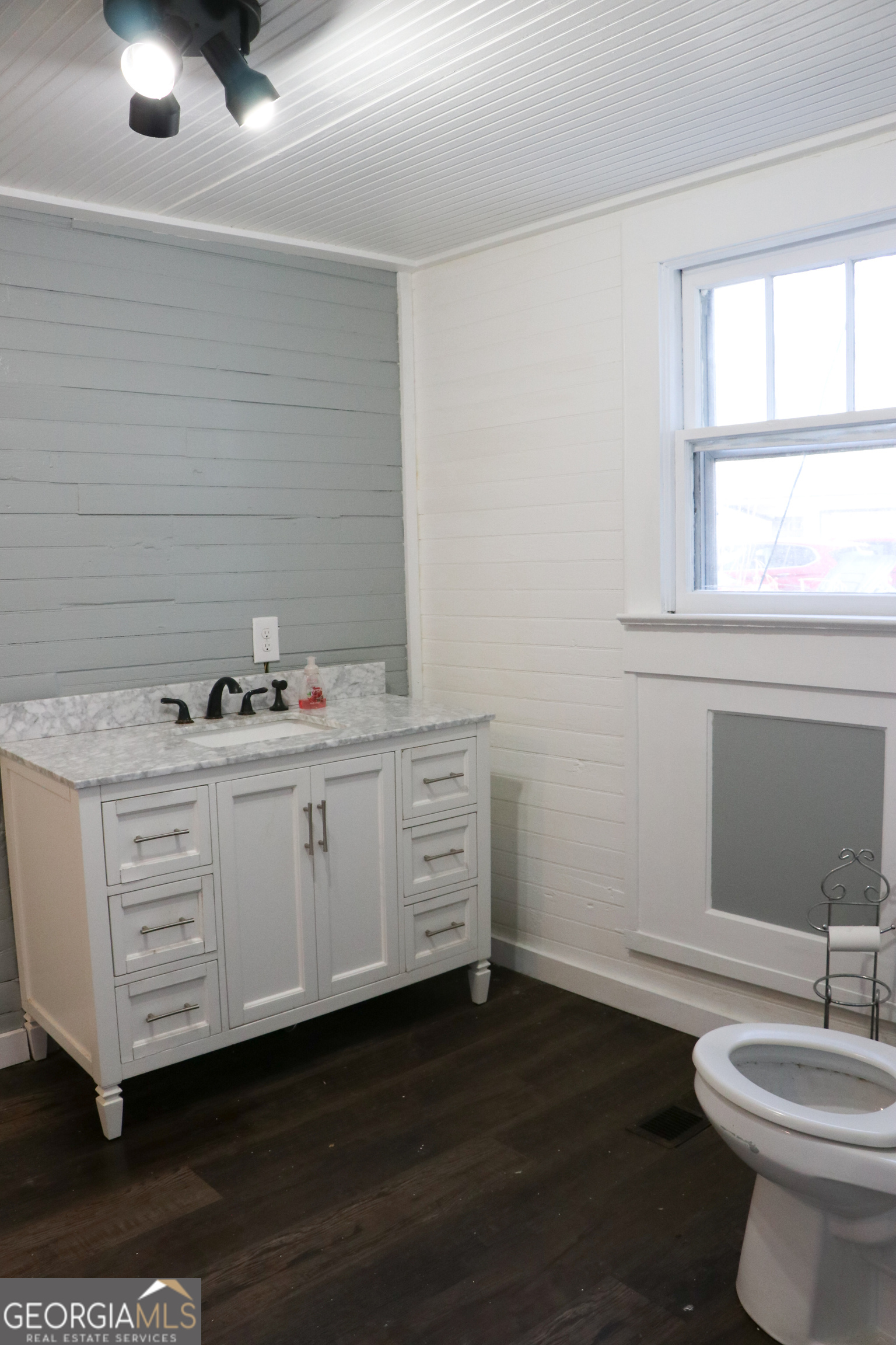 441 Lyerly Dam Road Lyerly, GA 30730 - Photo 45 of 80 a bathroom with a toilet sink and mirror