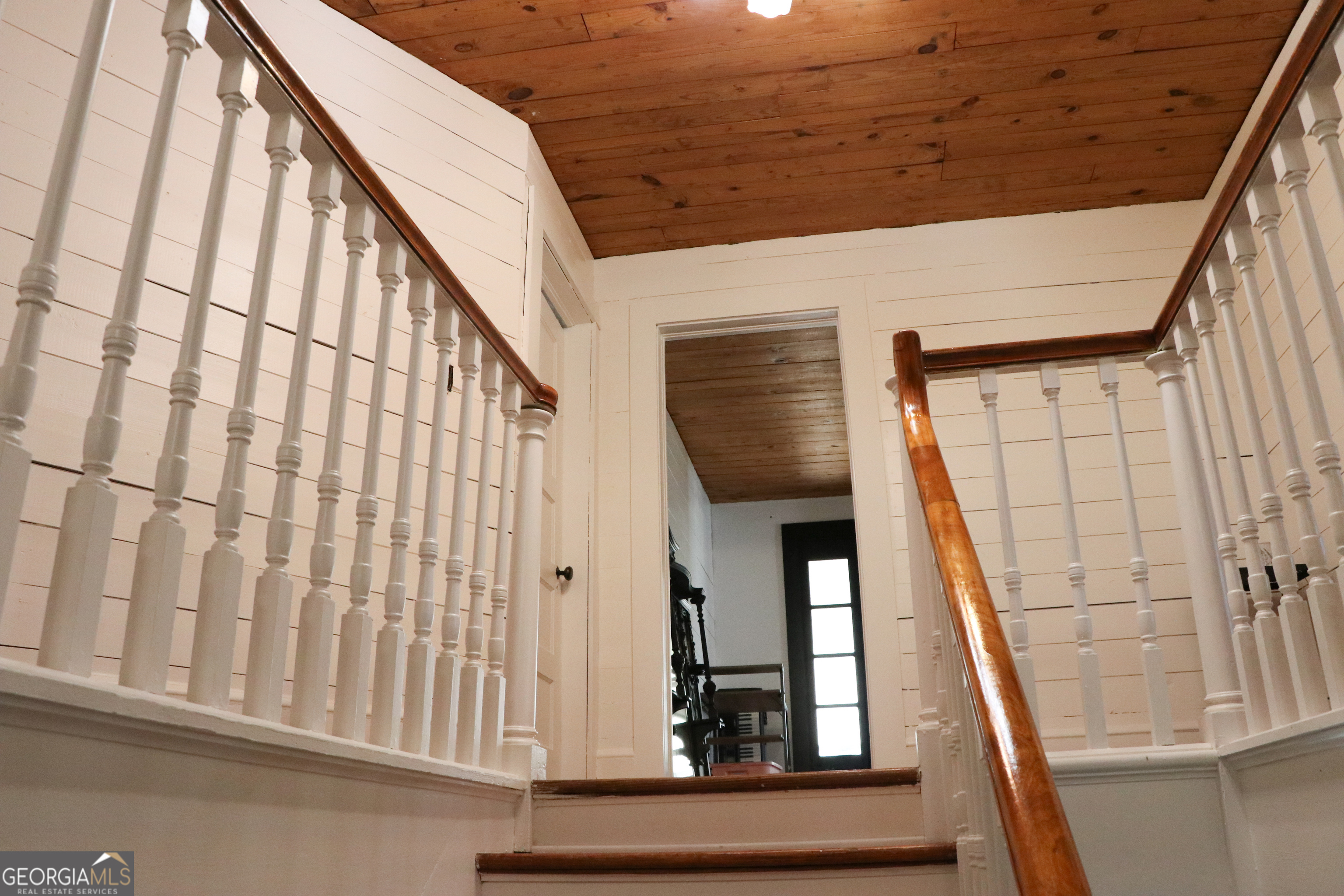 441 Lyerly Dam Road Lyerly, GA 30730 - Photo 51 of 77 a view of staircase with white walls and a window