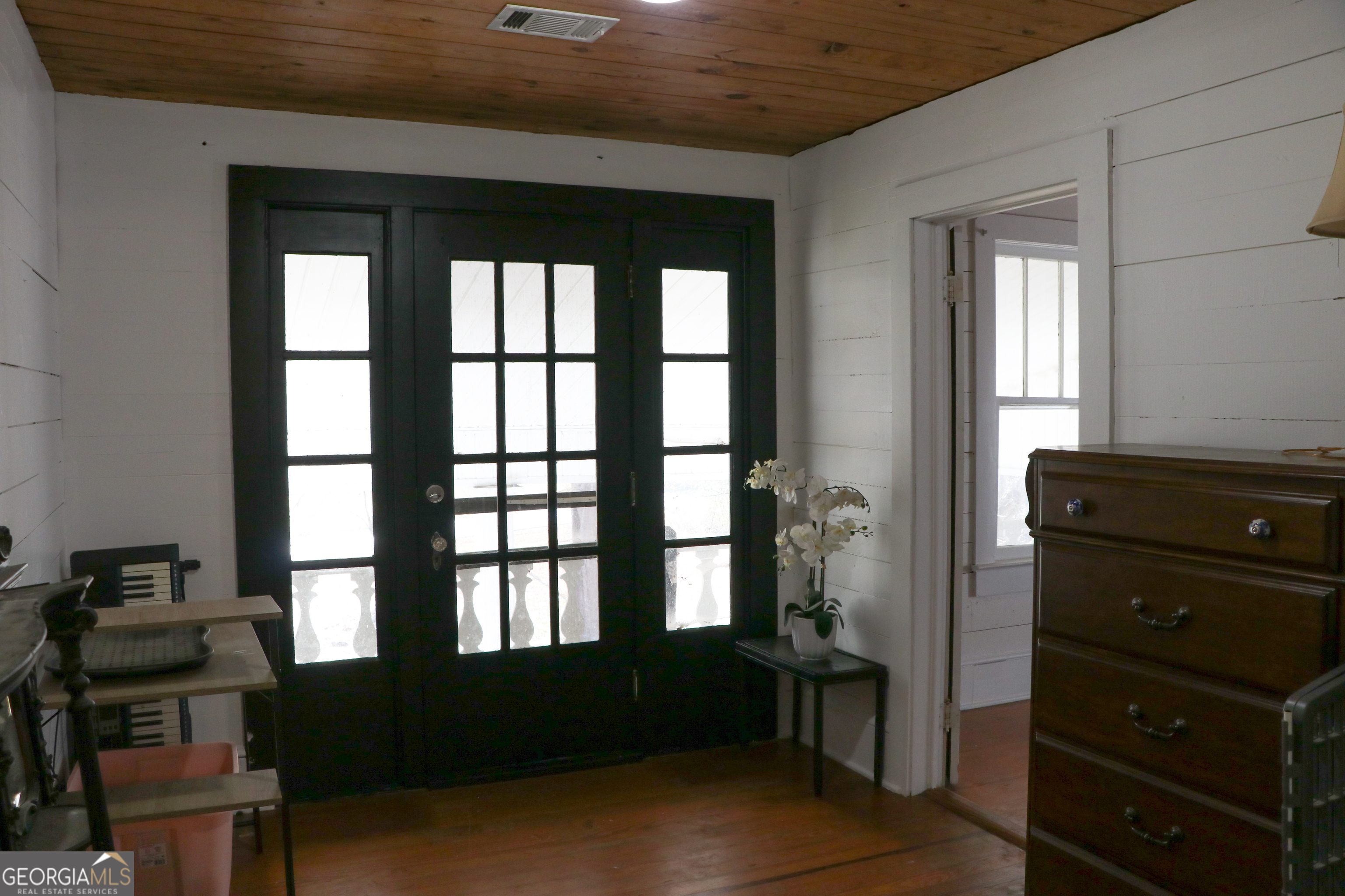 441 Lyerly Dam Road Lyerly, GA 30730 - Photo 56 of 77 a room with a chair and a window