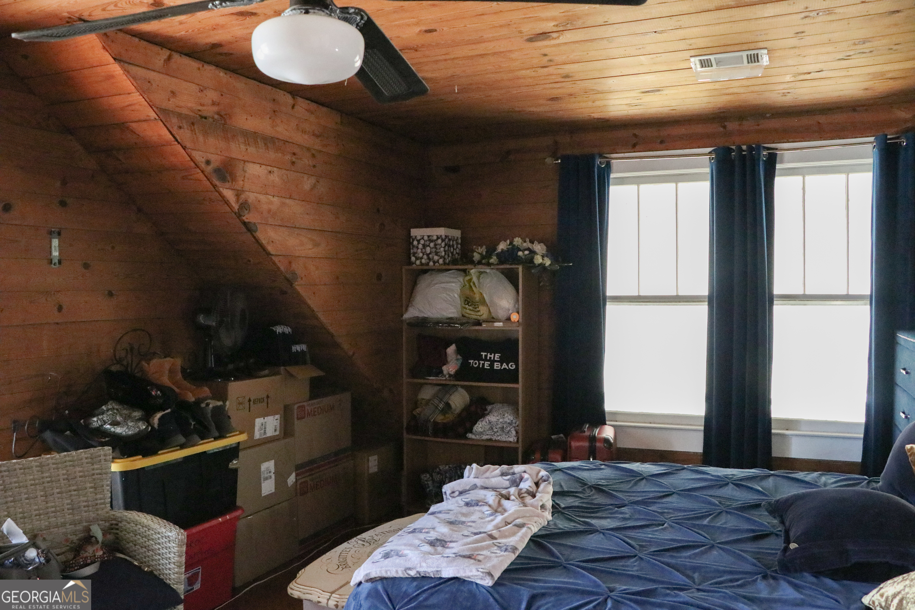 441 Lyerly Dam Road Lyerly, GA 30730 - Photo 63 of 80 a bedroom with bed and a window
