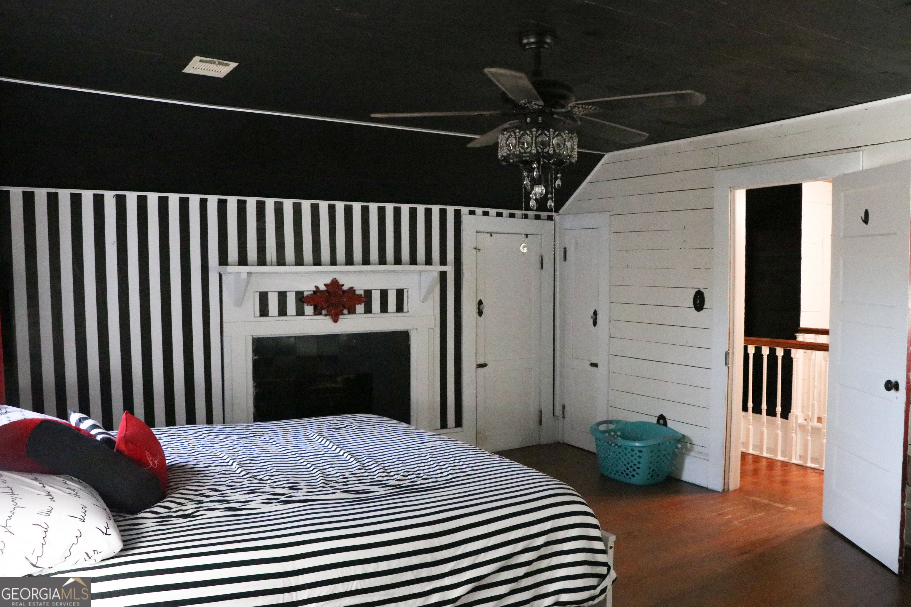 441 Lyerly Dam Road Lyerly, GA 30730 - Photo 72 of 80 a bedroom with a bed and a couch