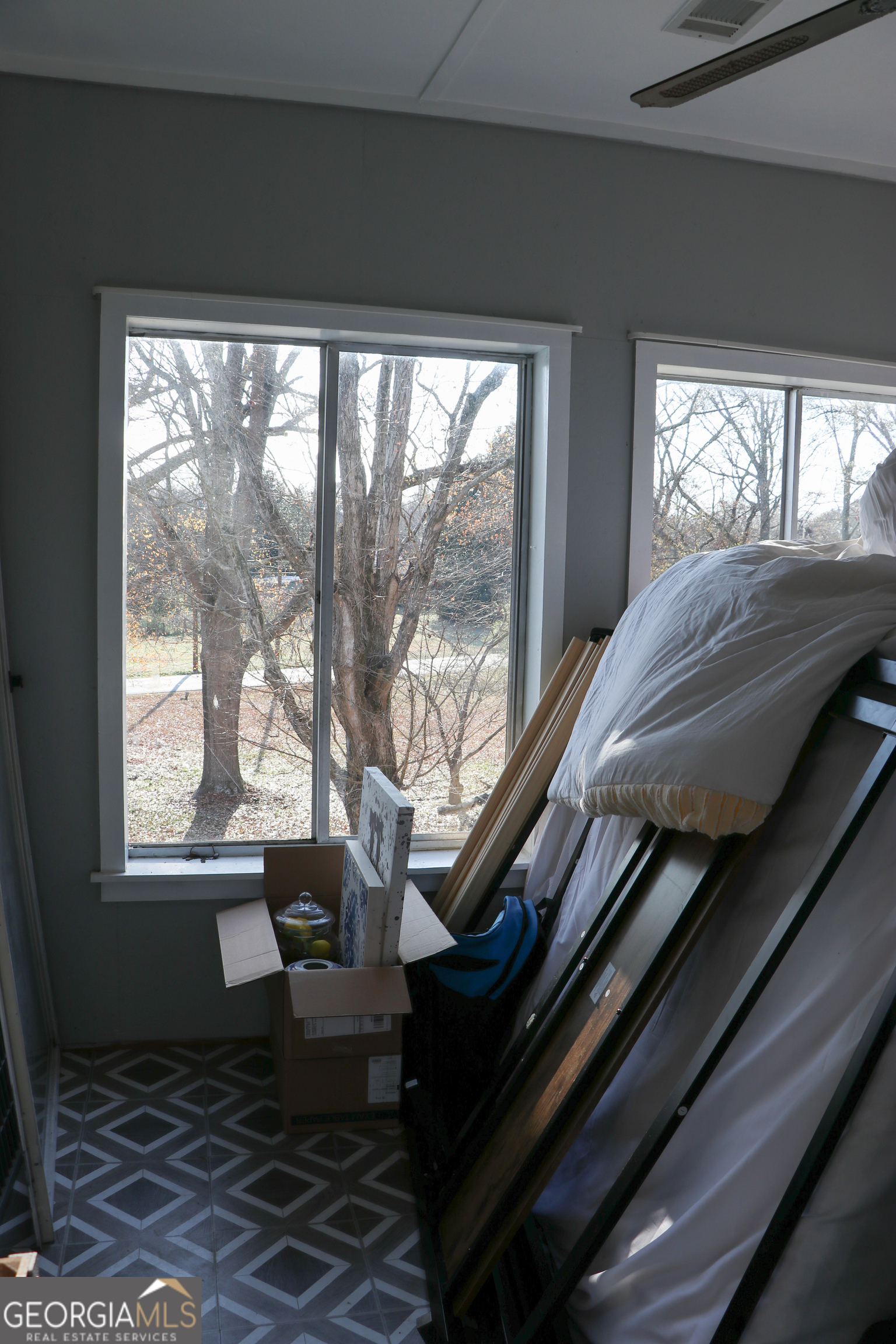 441 Lyerly Dam Road Lyerly, GA 30730 - Photo 73 of 77 a bedroom with a bed and wooden floor