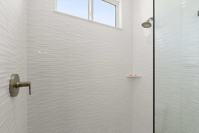 a kitchen with a sink and a window