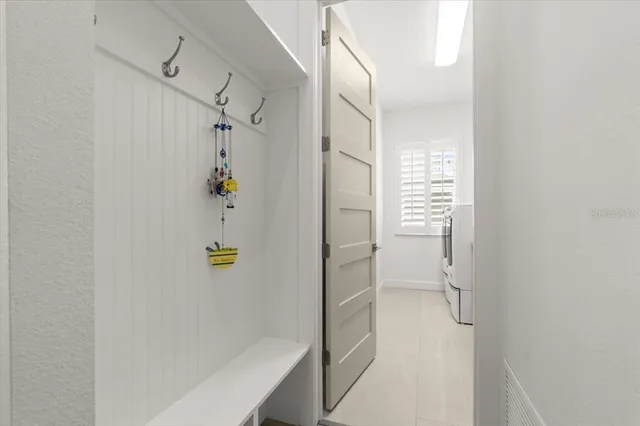 a outdoor space with a table and chairs