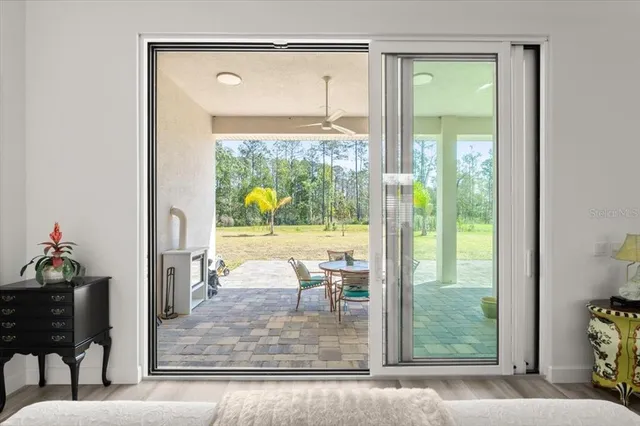 a view of a swimming pool with seating area