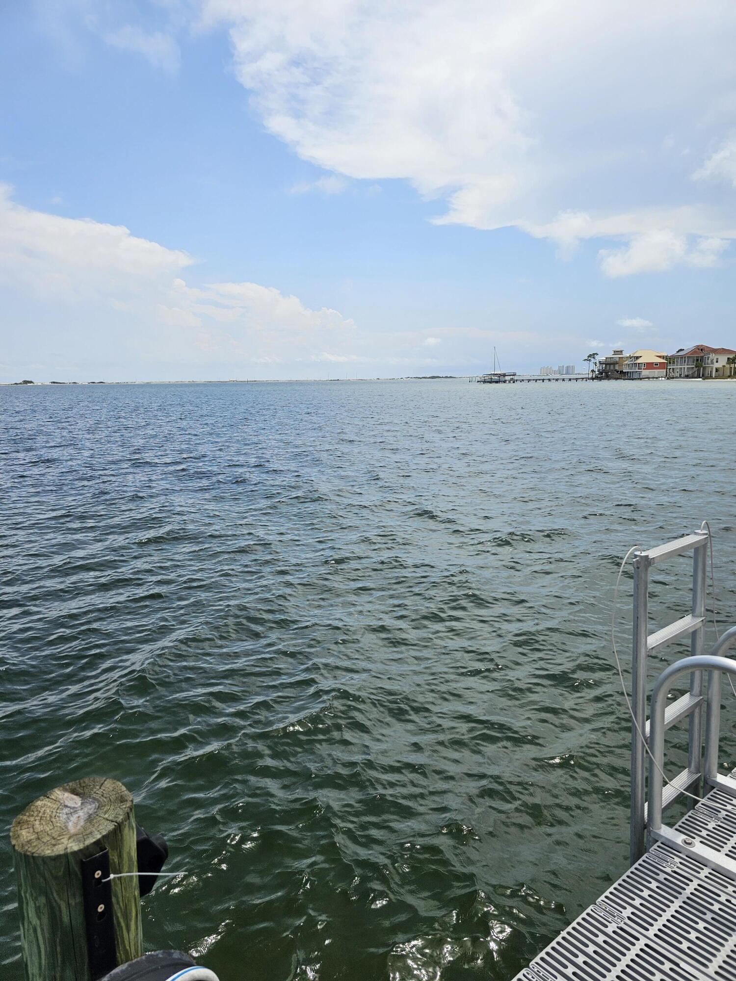 9389 Palmetto Ridge Court Navarre, FL 32566 - Photo 20 of 33 a view of a lake view