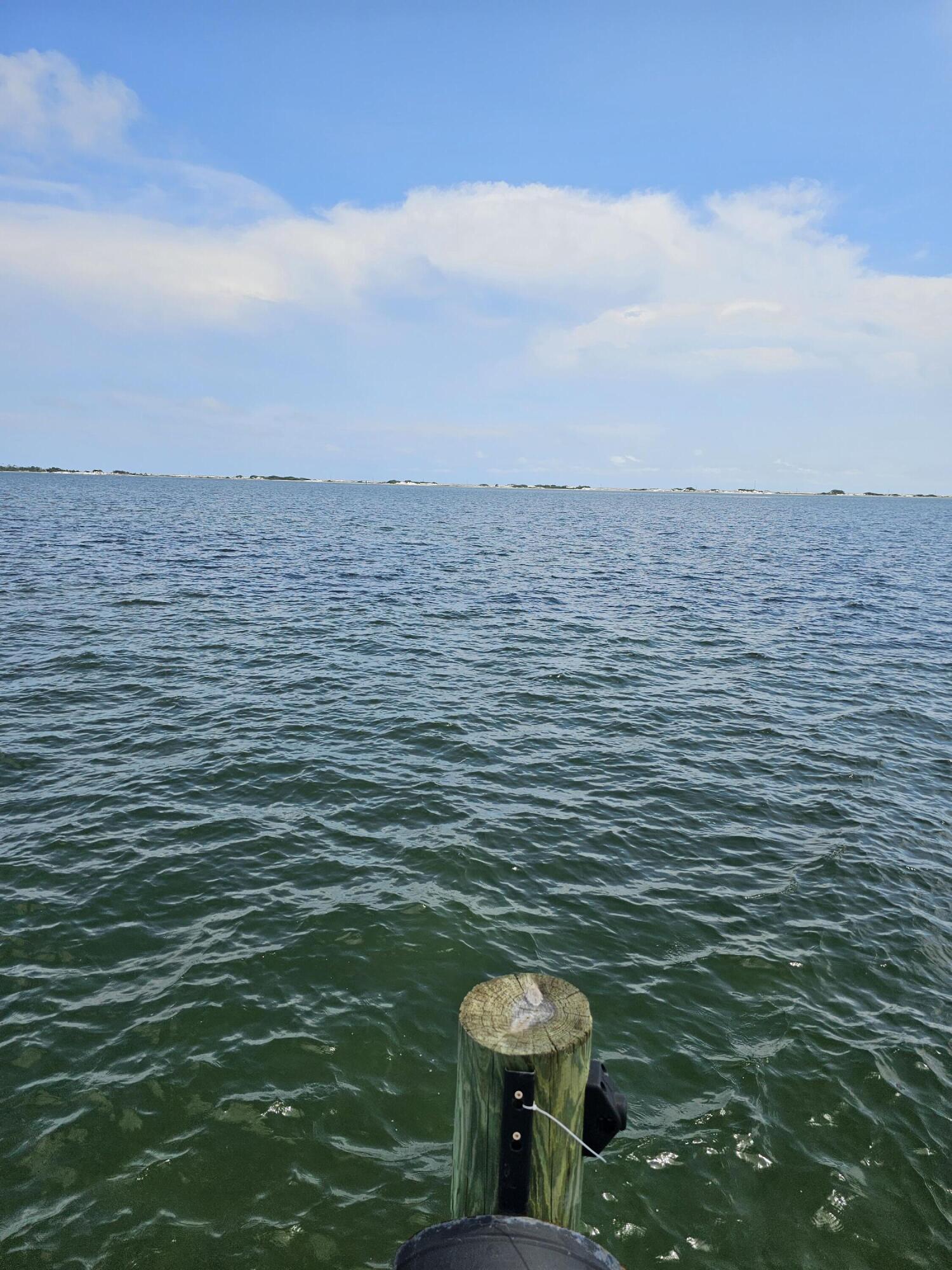 9389 Palmetto Ridge Court Navarre, FL 32566 - Photo 21 of 33 a bathroom with a toilet and a sink
