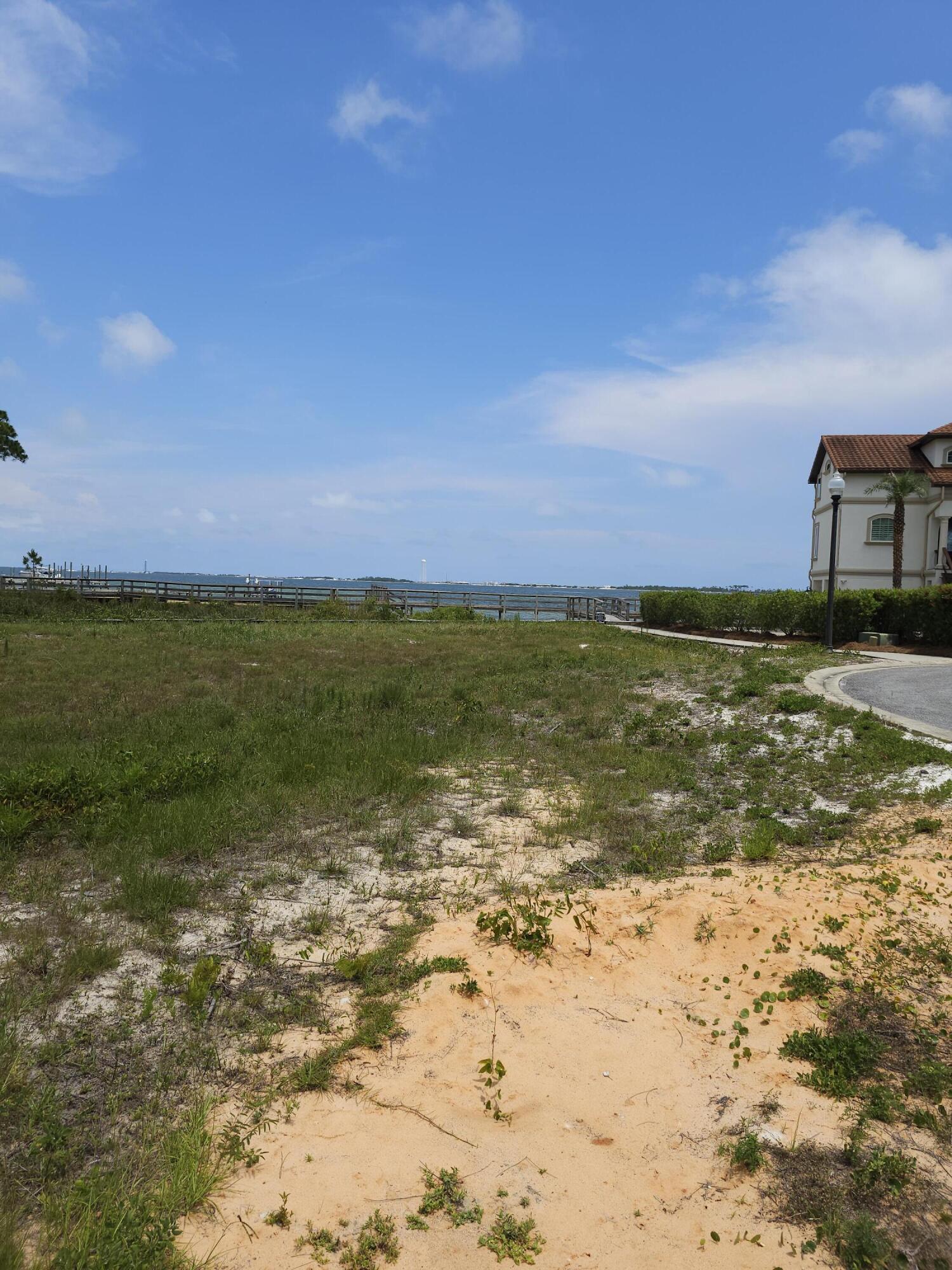 9389 Palmetto Ridge Court Navarre, FL 32566 - Photo 24 of 33 a view of an ocean beach