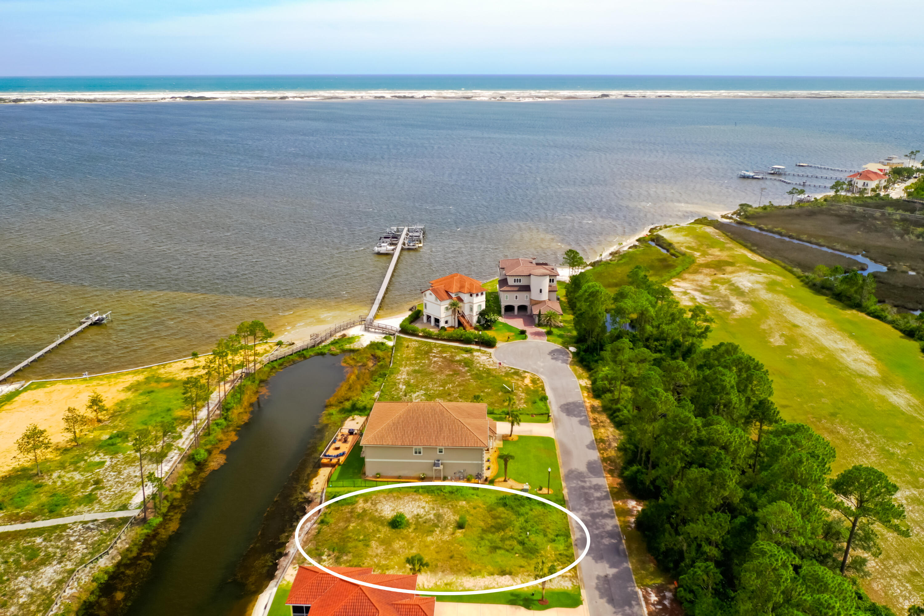 9389 Palmetto Ridge Court Navarre, FL 32566 - Photo 3 of 33 a view of a swimming pool with an ocean view