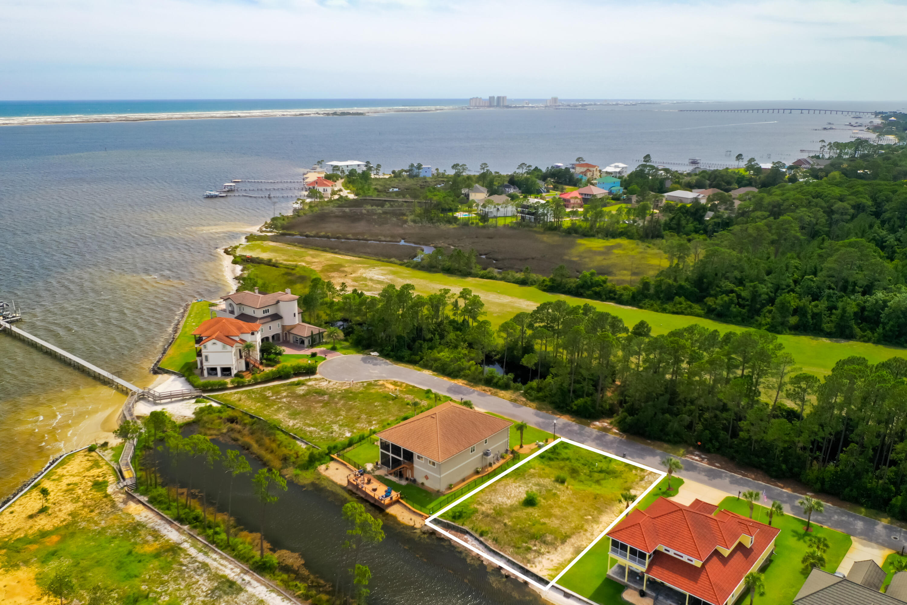 9389 Palmetto Ridge Court Navarre, FL 32566 - Photo 5 of 33 an aerial view of a house with a ocean view