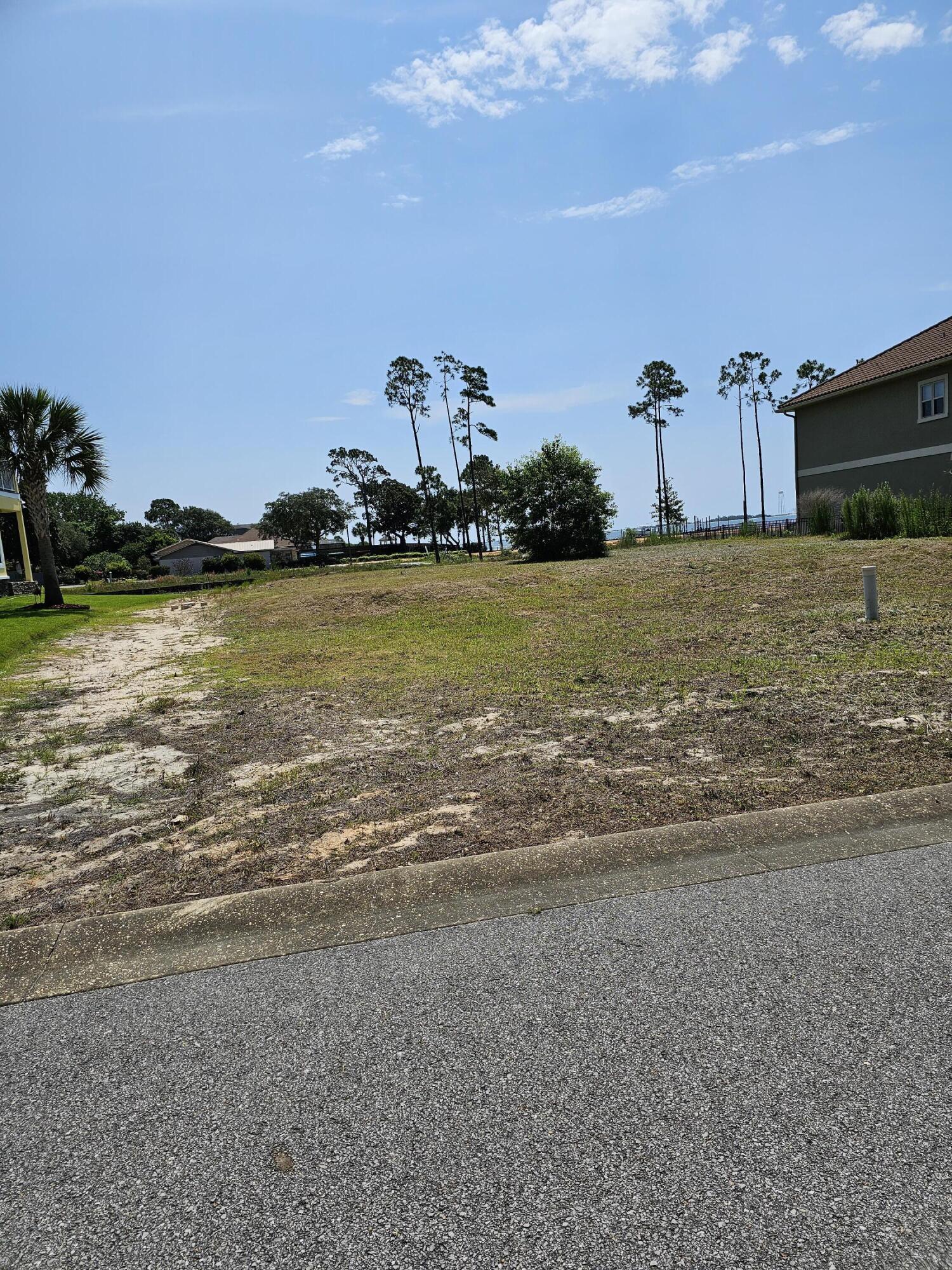 9389 Palmetto Ridge Court Navarre, FL 32566 - Photo 8 of 33 a view of a lake view
