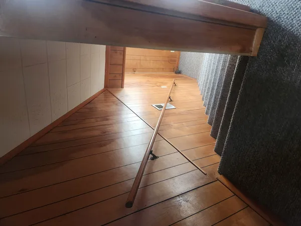 a kitchen with stainless steel appliances granite countertop a refrigerator a sink a stove and a refrigerator