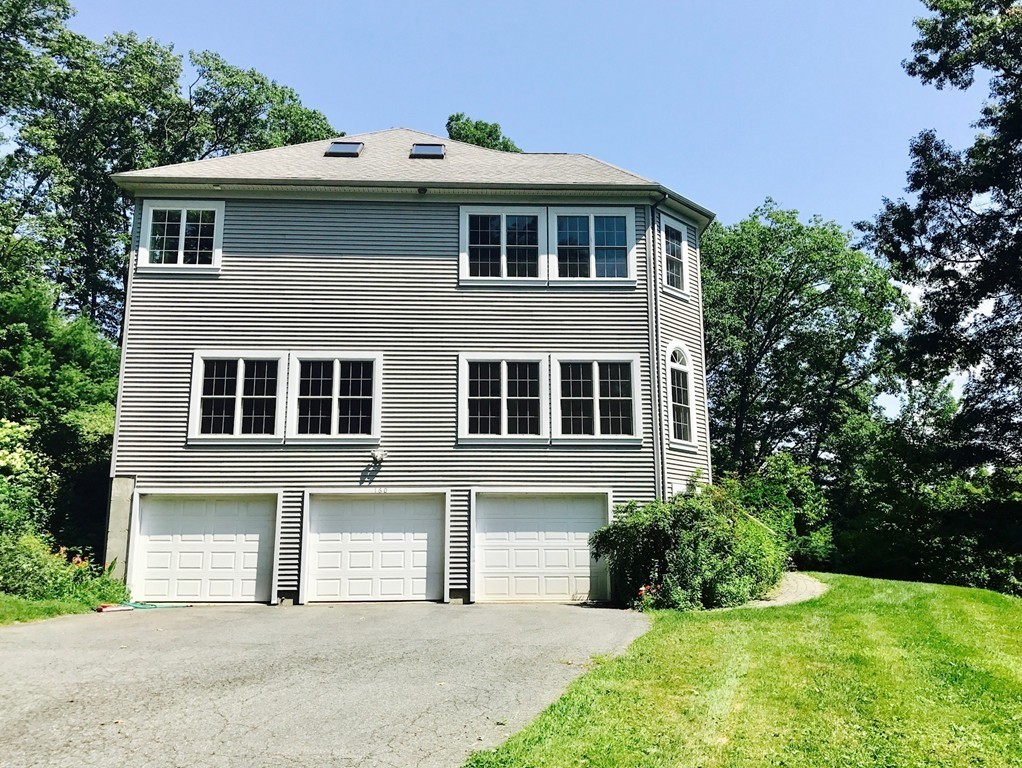 160 East Leverett Road Amherst, MA 01002 - Photo 2 of 30 a front view of a house with a yard