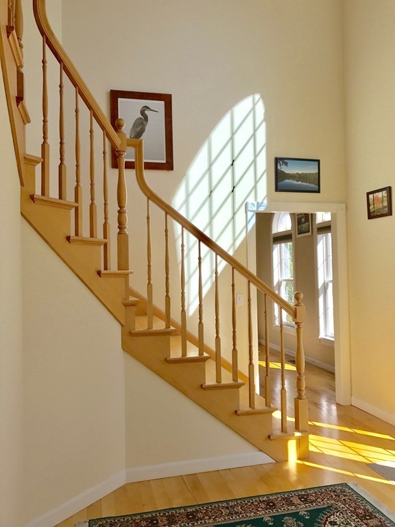 160 East Leverett Road Amherst, MA 01002 - Photo 4 of 30 a view of entryway and hall with wooden floor