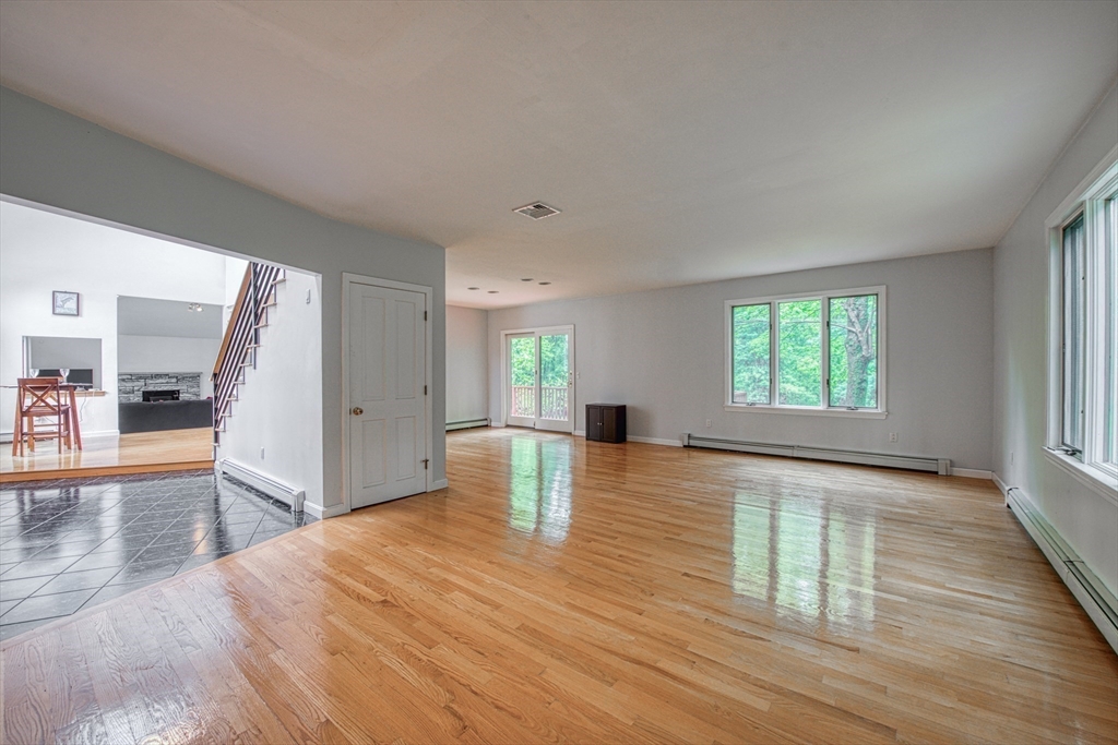 7 Tisdale Road Sharon, MA 02067 - Photo 9 of 37 wooden floor in an empty room with a window