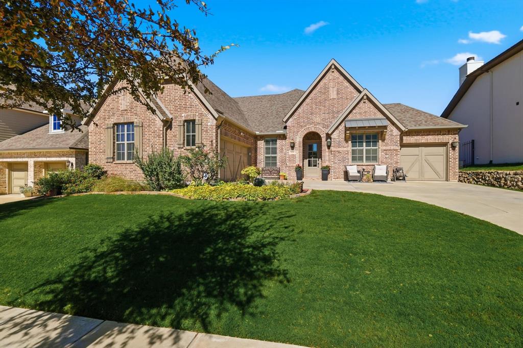 529 Prairie Run Aledo, TX 76008 - Photo 1 of 40 a front view of a house with a yard and garage