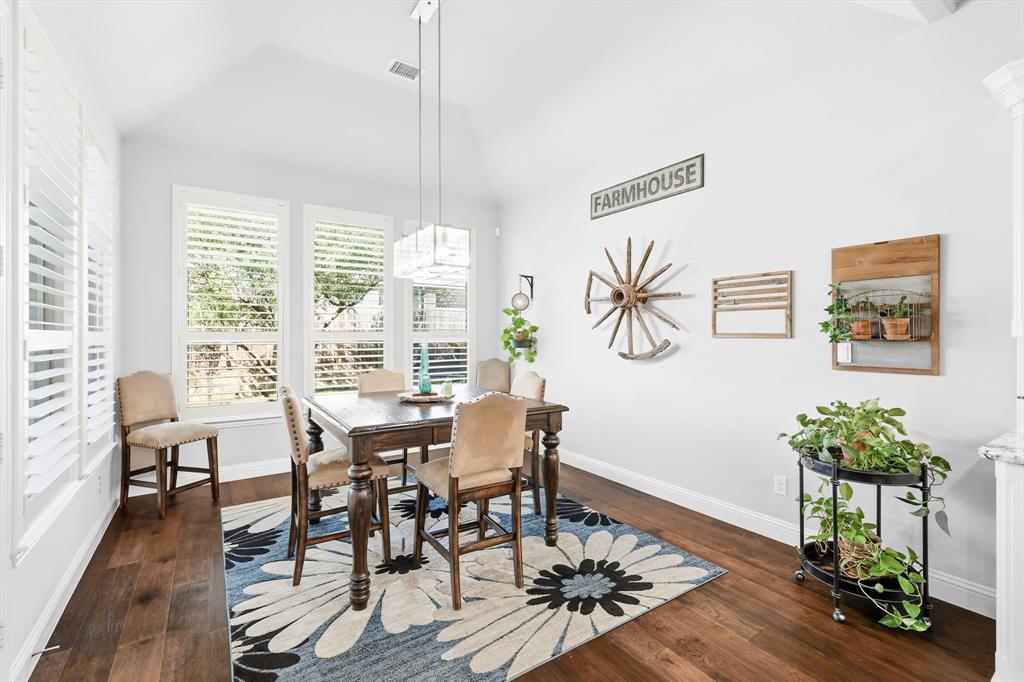 529 Prairie Run Aledo, TX 76008 - Photo 16 of 40 a view of a dining room with furniture window and wooden floor