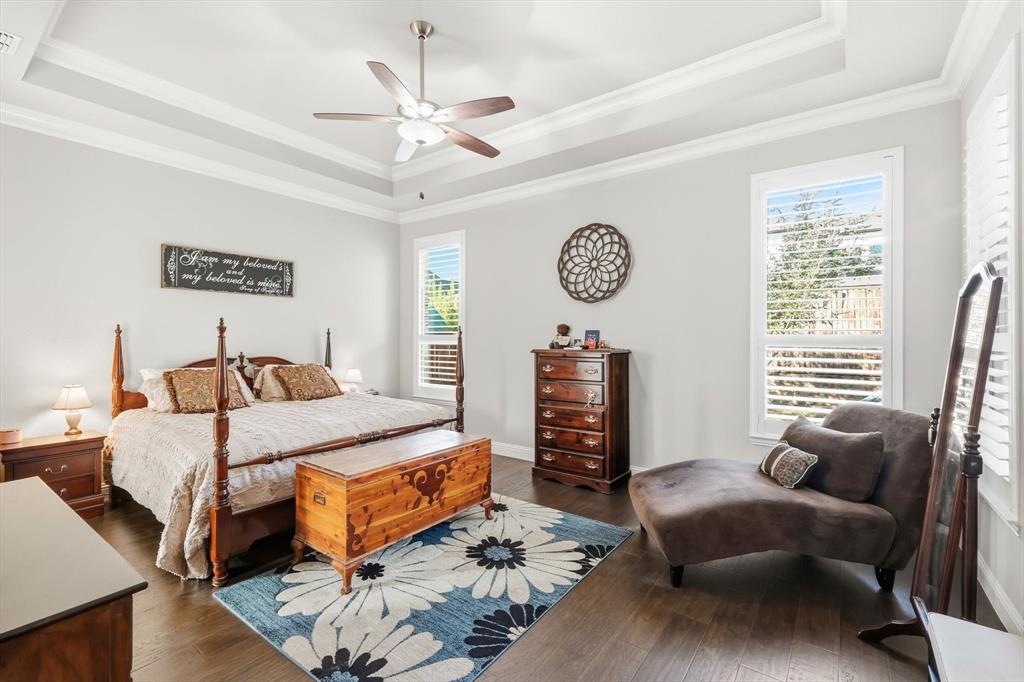 529 Prairie Run Aledo, TX 76008 - Photo 17 of 40 a bedroom with a bed a couch and a window