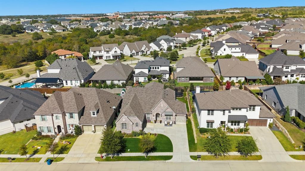 529 Prairie Run Aledo, TX 76008 - Photo 2 of 40 an aerial view of residential houses with outdoor space