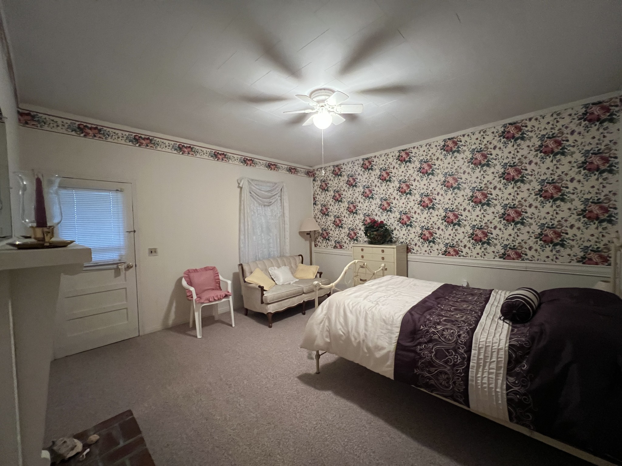 297 Appleton Road Five Points, TN 38457 - Photo 29 of 44 a bedroom with bed and a chandelier