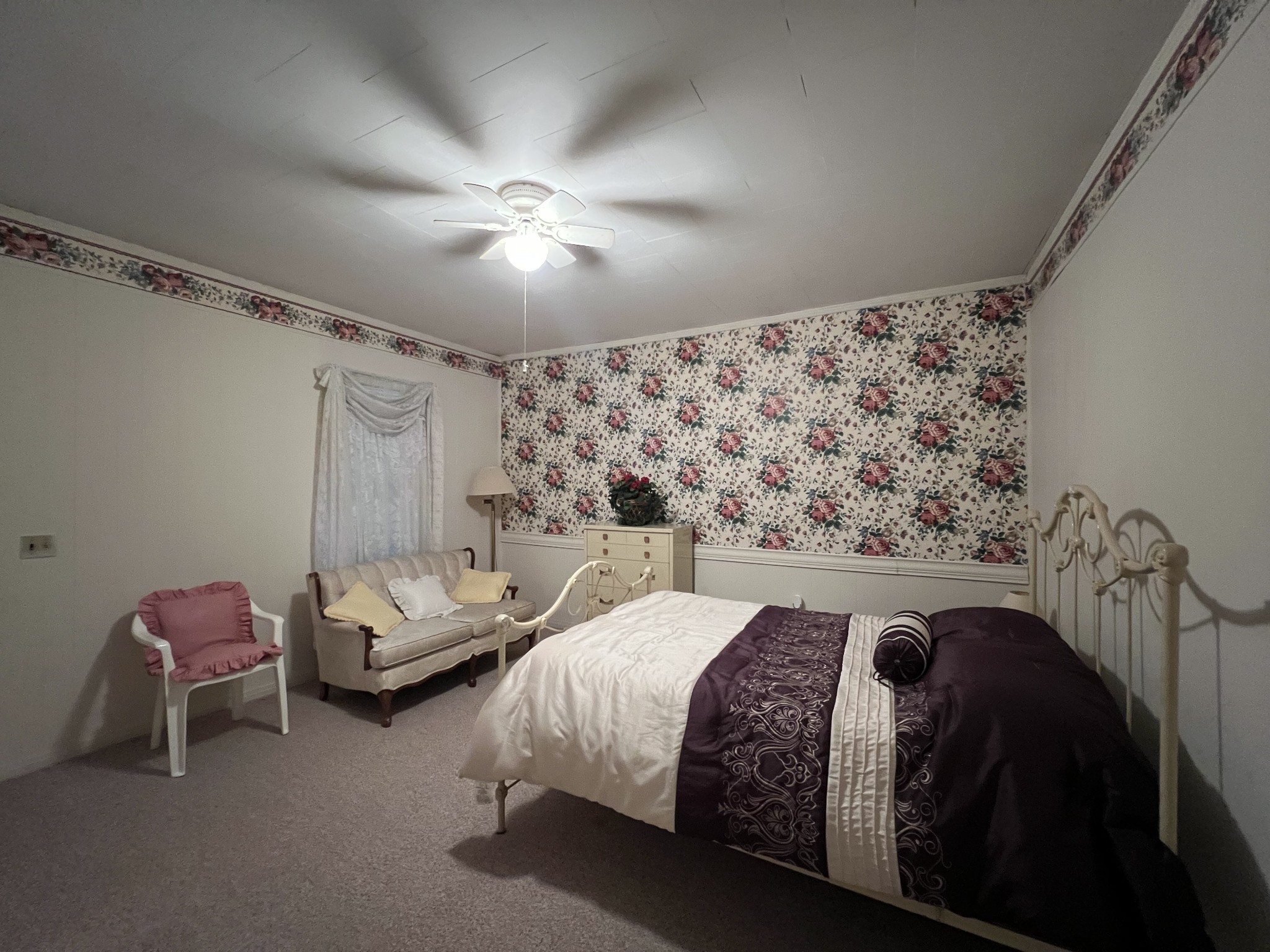 297 Appleton Road Five Points, TN 38457 - Photo 31 of 44 a bed room with a bed and a chair