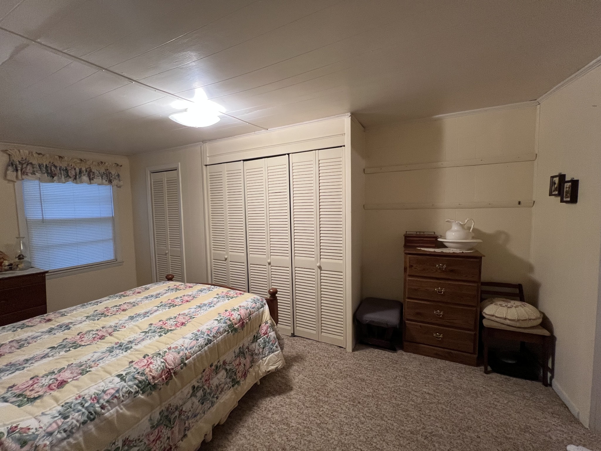 297 Appleton Road Five Points, TN 38457 - Photo 32 of 44 a bedroom with a bed and a closet