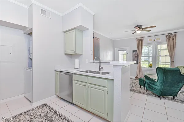 a spacious bathroom with a granite countertop sink and a mirror