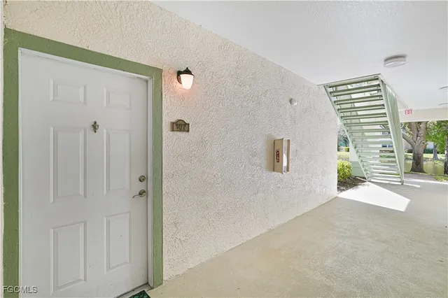 a view of a hallway with windows