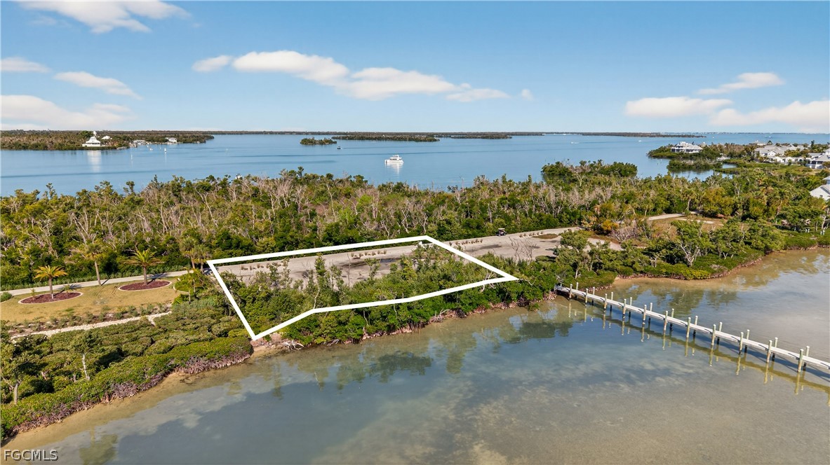 440 Useppa Island Bokeelia, FL 33922 - Photo 12 of 25 a view of a terrace with chairs