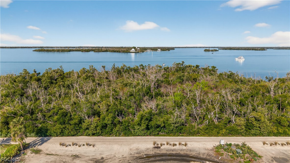 440 Useppa Island Bokeelia, FL 33922 - Photo 13 of 25 view of a lake with a yard