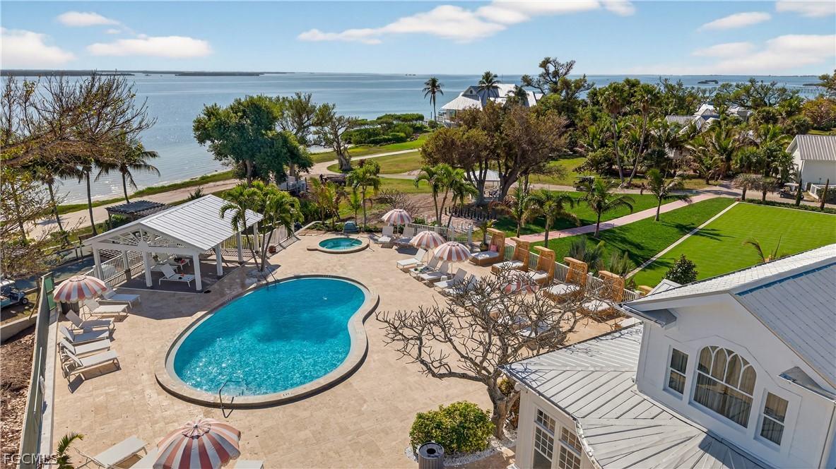 440 Useppa Island Bokeelia, FL 33922 - Photo 18 of 25 an aerial view of a house having yard